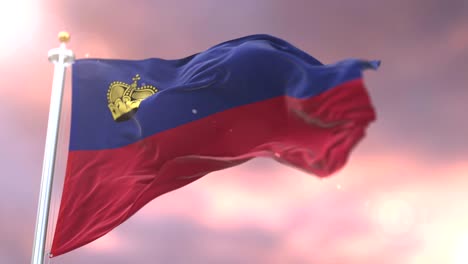 flag of liechtenstein waving at wind at sunset in slow, loop