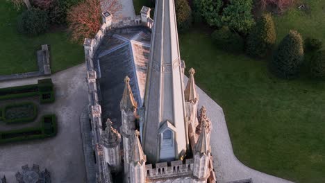 closeup of clock tower of ashridge house, event venue in hertfordshire, england, uk. - aerial shot