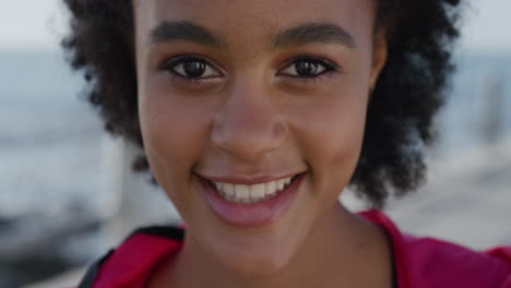 close up cute african american woman smiling cheerful enjoying happy lifestyle beautiful black female student healthy perfect skin wearing afro hairstyle real people series