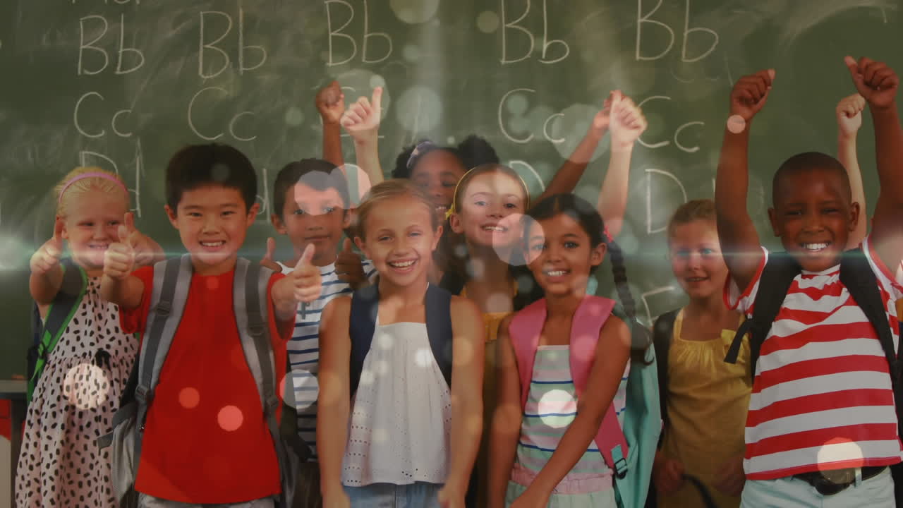 Pupils smiling and raising thumb in class
