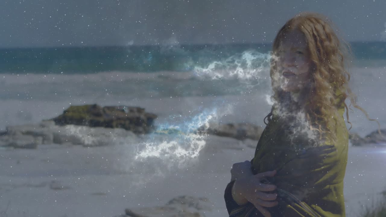 Gravid kvinde spadserer ved stranden, holder om sin mave, opnår indre ro og synkroniserer med åndedrættet, mens bekymringerne forsvinder.