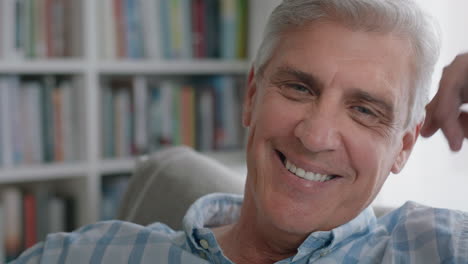 portrait-happy-mature-man-smiling-confident-senior-male-enjoying-successful-retirement-feeling-positive-at-home-4k-footage