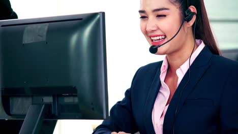 Business-people-wearing-headset-working-in-office