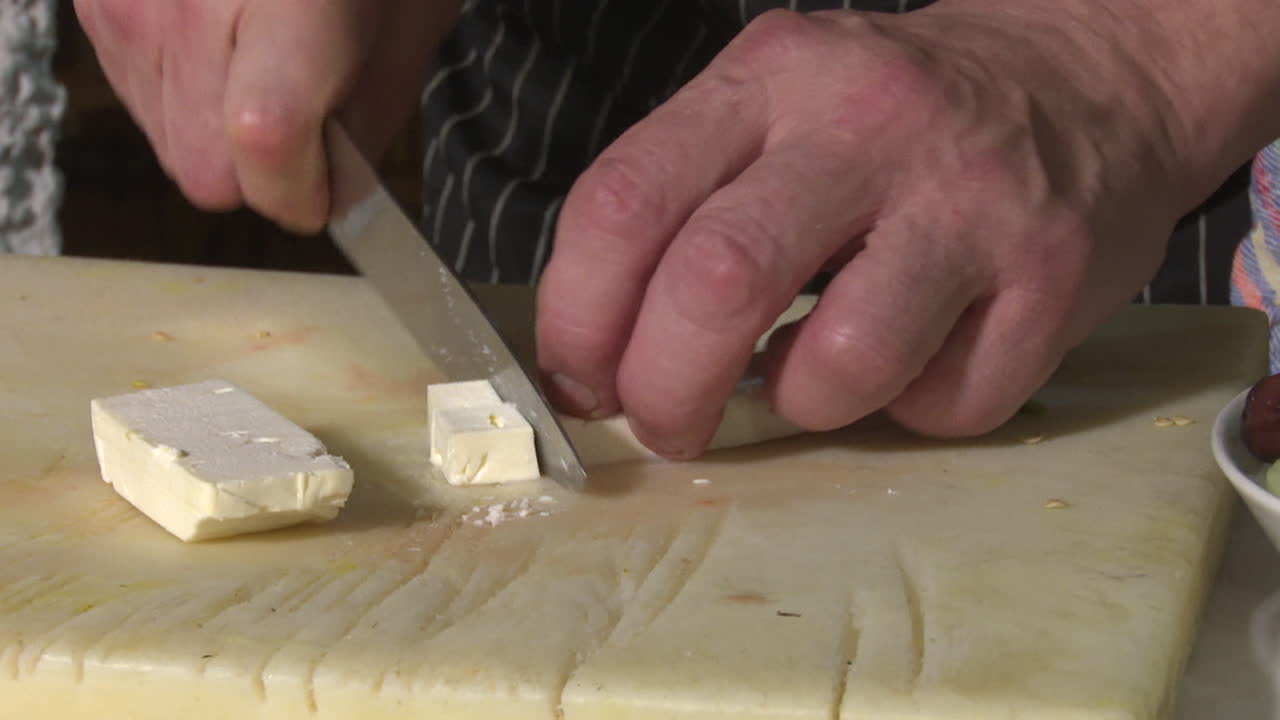 Chef Cutting Feta Cheese