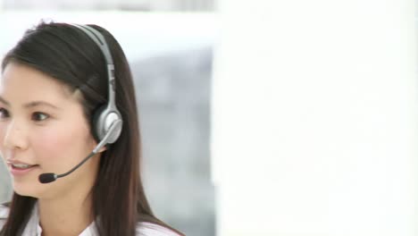 attractive businesswoman with headset on