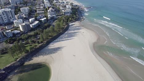 waves and white sandy beach, kings beach, caloundra, queensland, australia - aerial drone shot