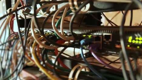 network switch and ethernet cable in rack cabinet. network connection technology and has a status led to show working status. concept of infrastructure with cables connected to data center