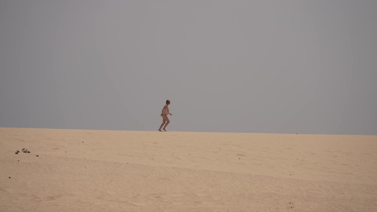 running over volcanic dunes and feeling the freedom in Fuerteventura, canary island