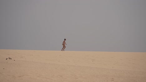 running over volcanic dunes and feeling the freedom in fuerteventura, canary island