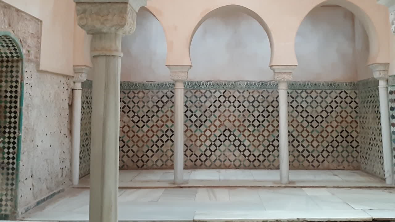 Comares Bath or Central room of bath in Alhambra, Granada. Zoom out Tilt up