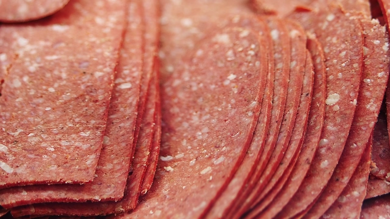Close-up of Thinly Sliced Salami or Cured Meat