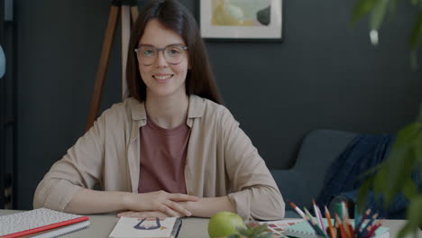 woman artist smiling at camera