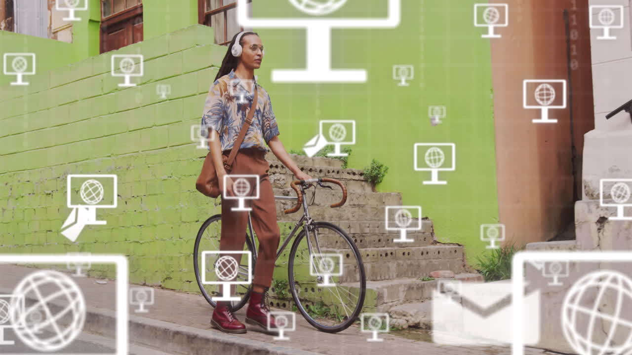animación de una red de iconos de pantalla con globos sobre un hombre biracial con bicicleta.