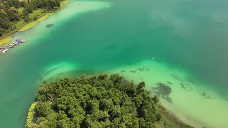 hallwilersee, a turquoise lake of glacial origin, popular for swimming, boating and hiking. drone view of clear water