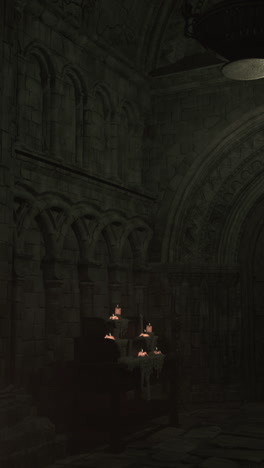 dark and mysterious interior of an old church or castle with candles