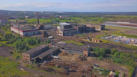 aerial view of an industrial complex and surrounding area