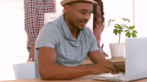 casual businessman working on laptop