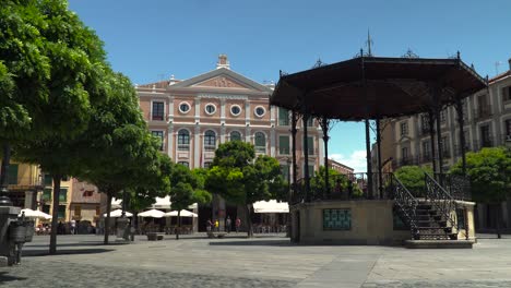 a sunny day in a beautiful spanish plaza
