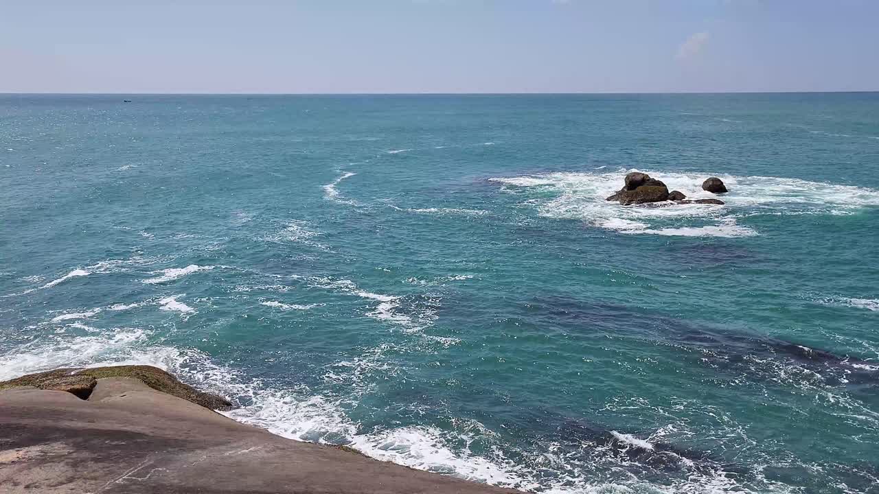 Moving waves of Indian ocean with blue water at Kanniyakumari, kerala