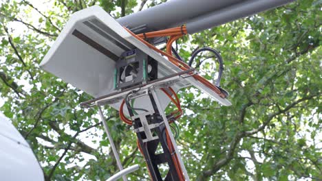 close up of pantograph charging the electric bus