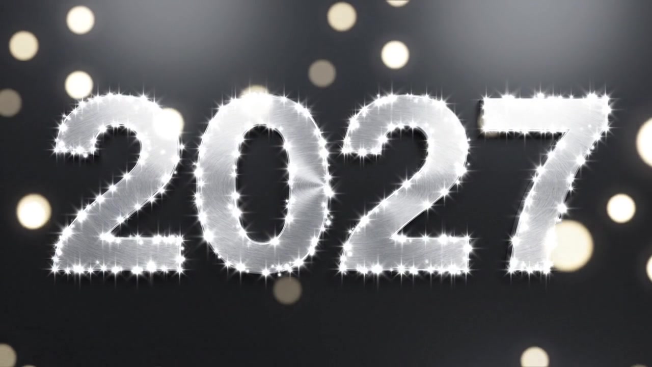 Animazione del numero Anno Nuovo 2027 con testo in grassetto color argento su sfondo scuro.