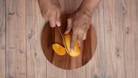 cutting a mango