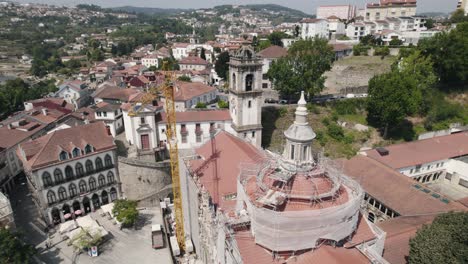 aerial close up shot of monastery of sao goncalo under restore, repair maintenance