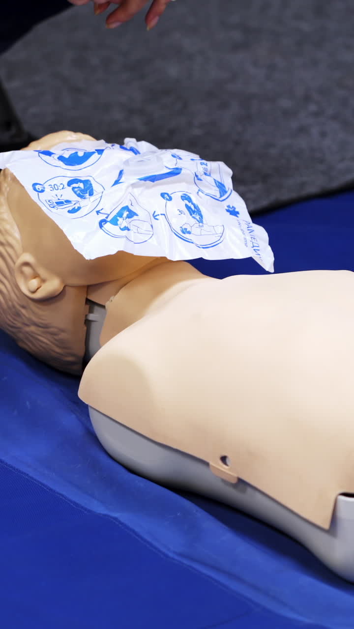 First medical help training equipment. Medical dummy and oxigen mask. Training video. Vertical video