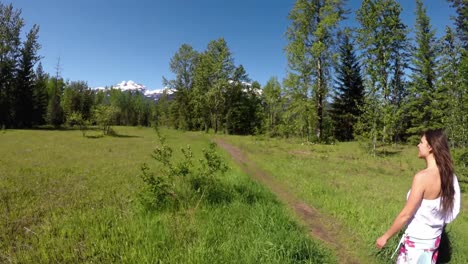 woman walking on path 4k