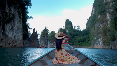 khao sok thailand, woman in longtail boat