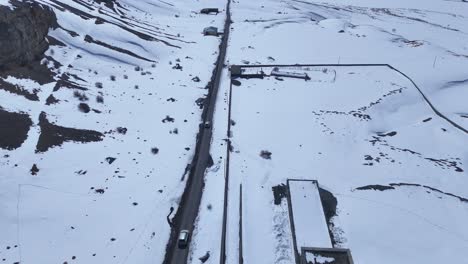 Snowy Mountain Road and Village