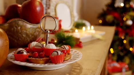 various christmas desserts on wooden table