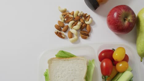 video of fresh fruit and vegetables on white background