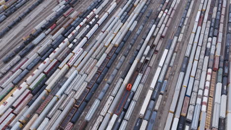 aerial footage panning across all the waiting trains at the train yard in chattanooga, tn.