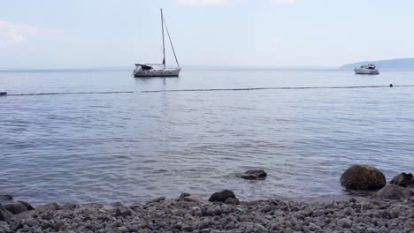 lonely sailboat at anchor in kvarner bay, croatia