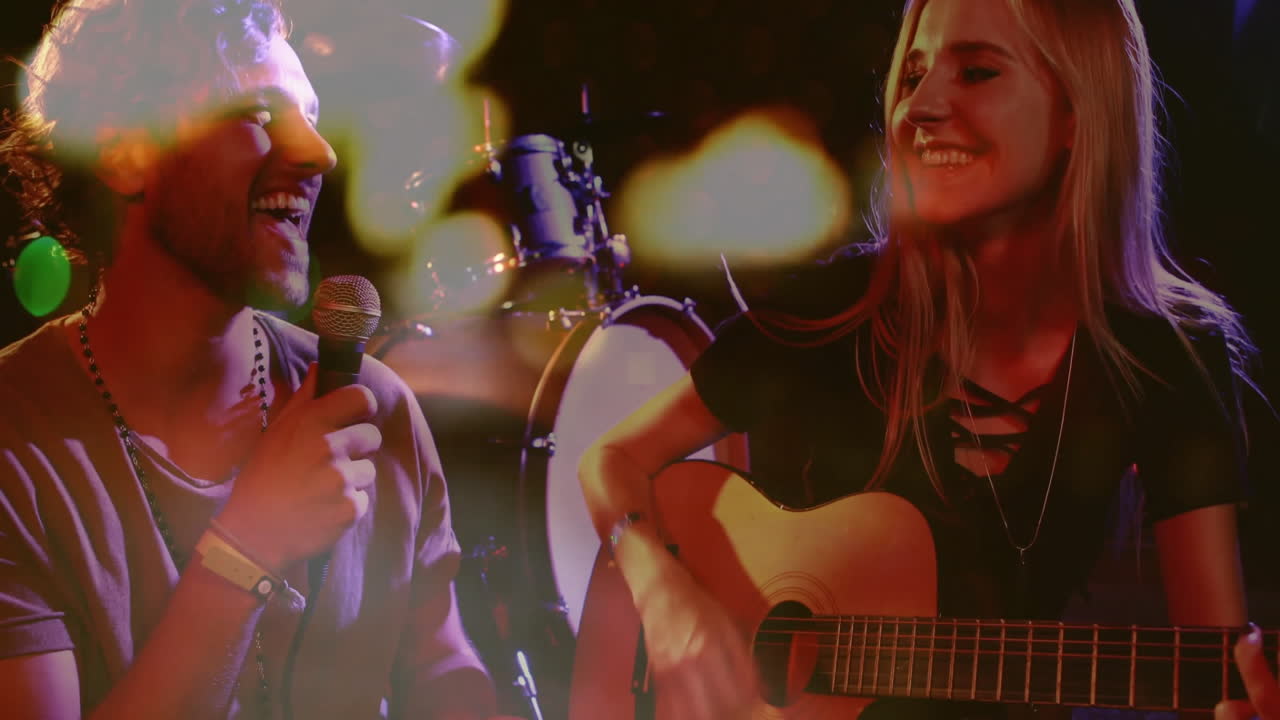 Male singer holding microphone and female guitarist strumming guitar with animated music sound bars