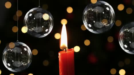 Christmas-candle-with-decoration-baubles-and-lights