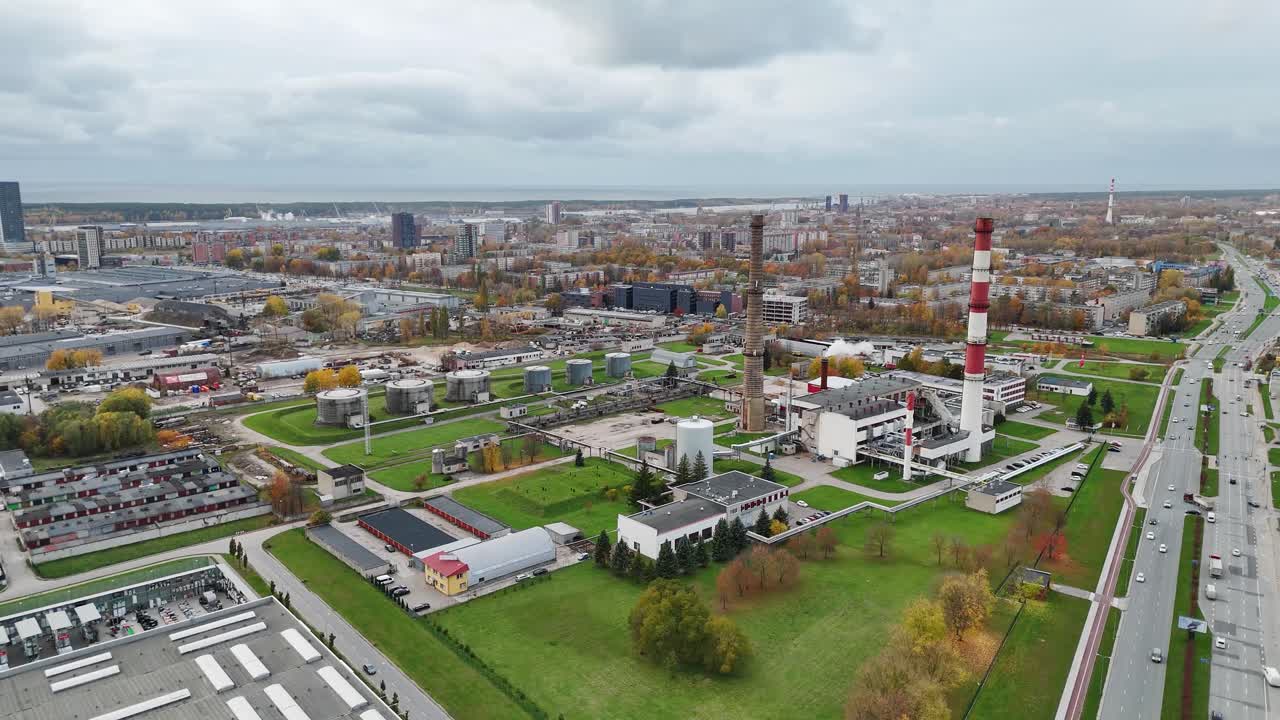 Aerial View of Industrial Area and Cityscape