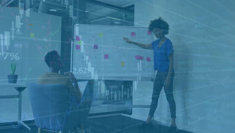 animation of financial data processing over diverse colleagues discussing work in office