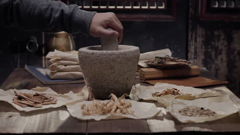 apocathery doctor working classification and preparation with herb and species mushroom anise turmeric in a table for traditional medicine advertising