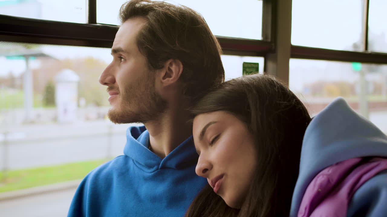 Close up view of a couple talking in the bus