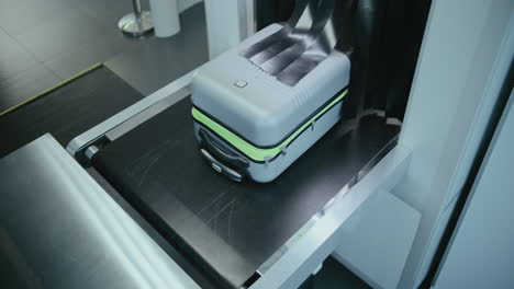 luggage at airport security x-ray