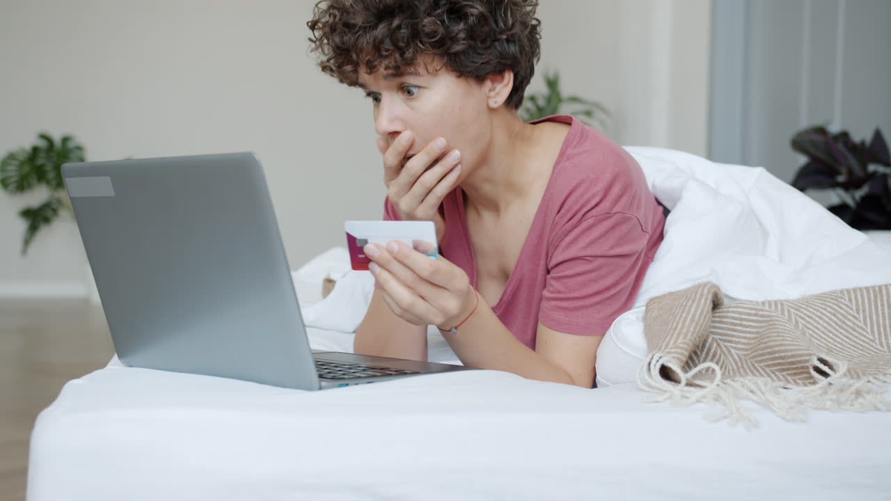 Woman Surprised/Frustrated with Online Shopping/Credit Card Payment