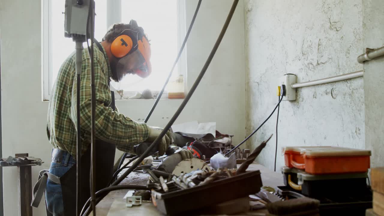 Craftsman working at workshop 4k