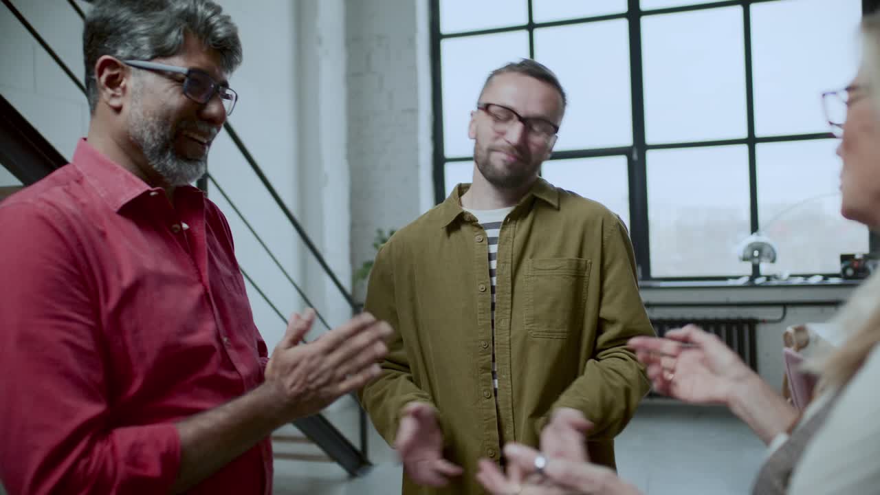 Professional Business Team Discussing Ideas in Modern Office