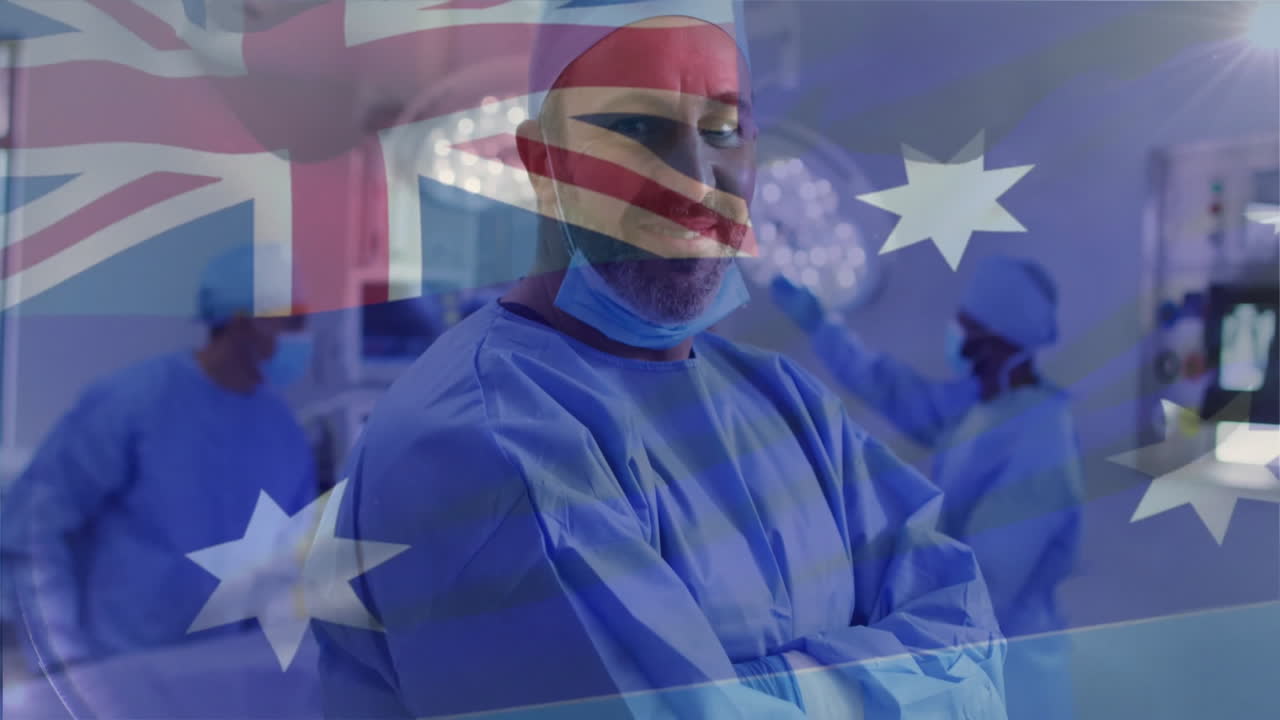 Animation of flag of australia over biracial male surgeon in hospital