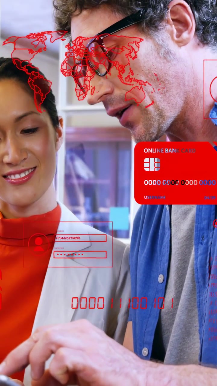 Vertical video: Man tapping tablet, woman nodding, red HUD world map overlaying for business review