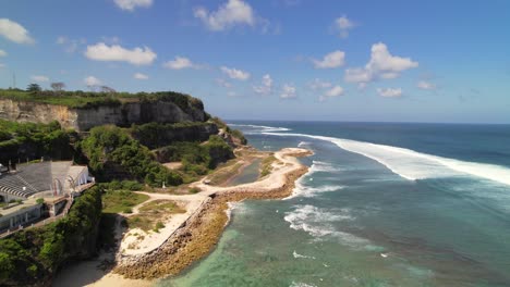 aerial view flying along melasti beach in uluwatu, bali indonesia