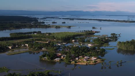 aerial view of rural village area surrounded by flood water