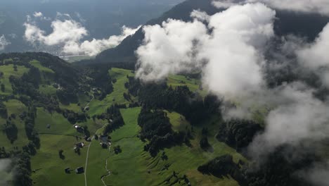 aerial view of mystical mountains: capturing the beauty of green peaks and clouds